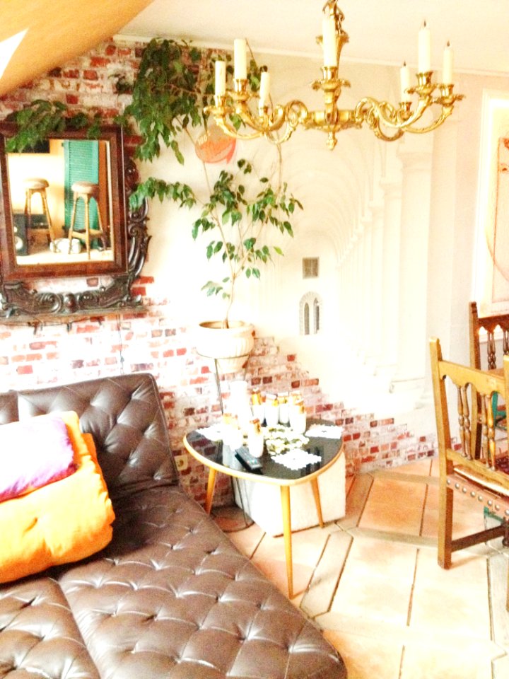 Brown Leather Bed Near Table And Dining Set