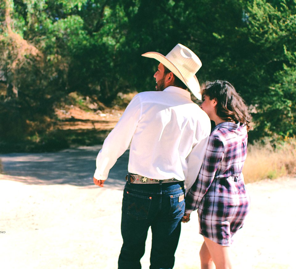 Man Wearing White Dress Shirt And White Cowboy Hat photo