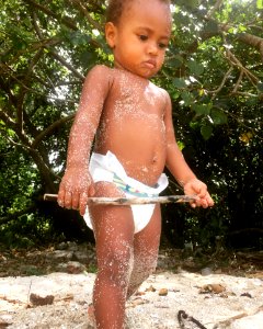 Standing Baby Wearing Diaper photo