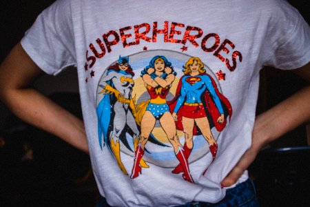 Person Wearing Superheroes Printed T-shirt photo