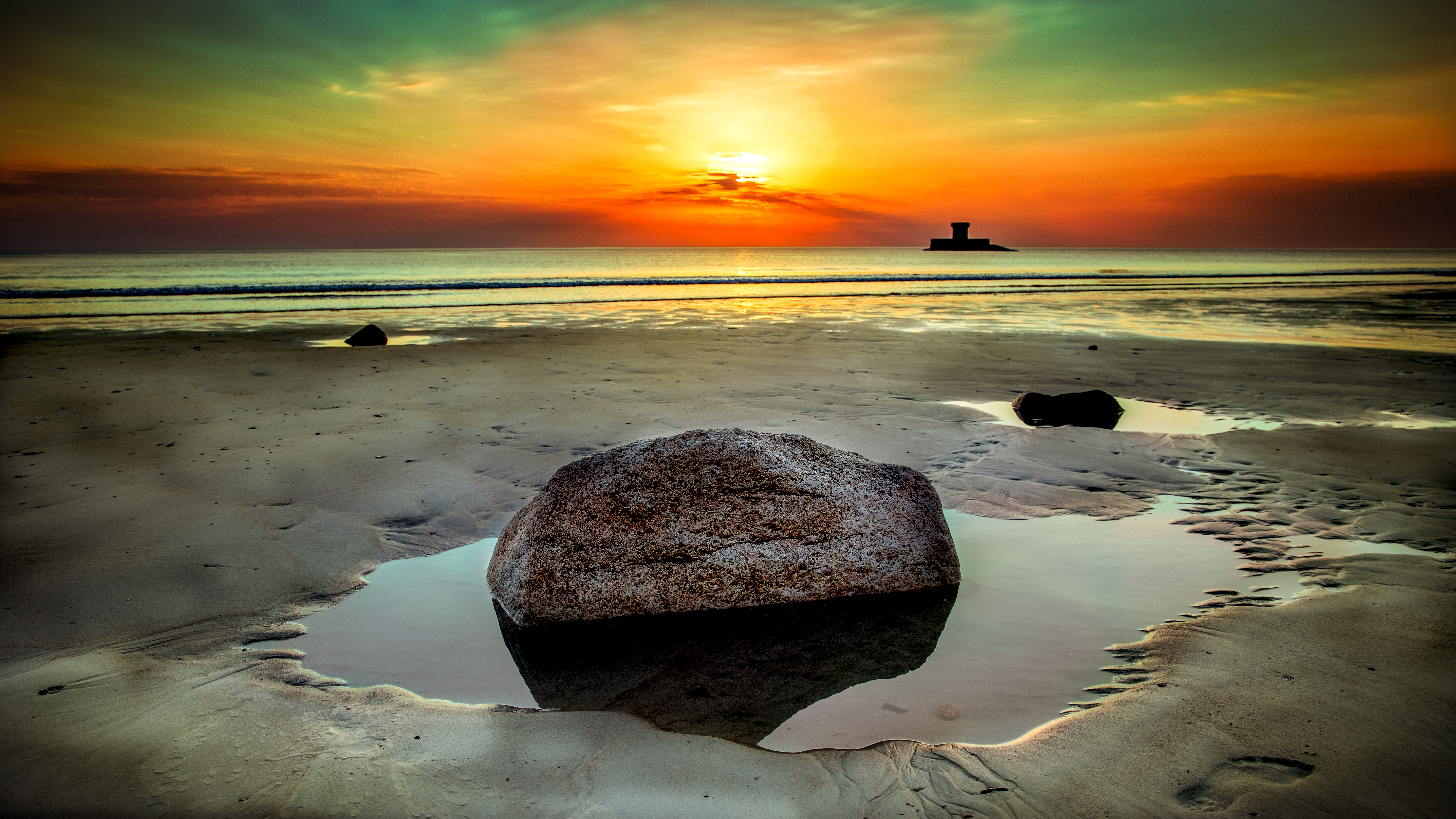 Stone Beside Seashore At Sunset photo
