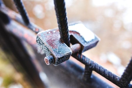 Rusty Padlock Covered With Hoarfrost Ice Crystals