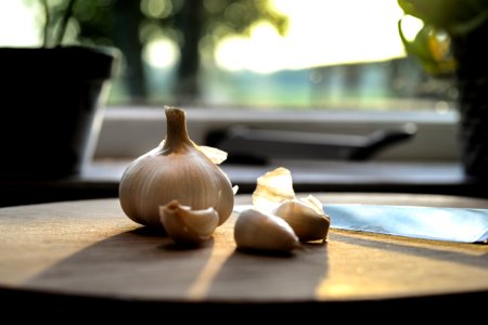 Photography Of Garlic On Wooden Table