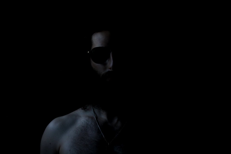 Grayscale Photography Of Topless Man Wearing Sunglasses photo