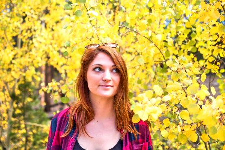 Woman Wearing Pink And Black Dress Shirt And Black Tank Top photo