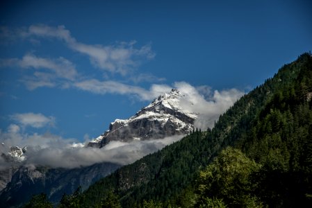 White And Green Mountain Under White Clouds photo