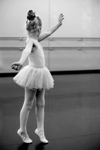 Grayscale Photography Of Girl Doing Ballet photo