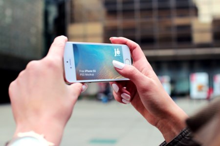 Person Holding Silver Iphone 5s photo