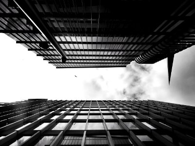 Black-and-white Buildings Clouds photo