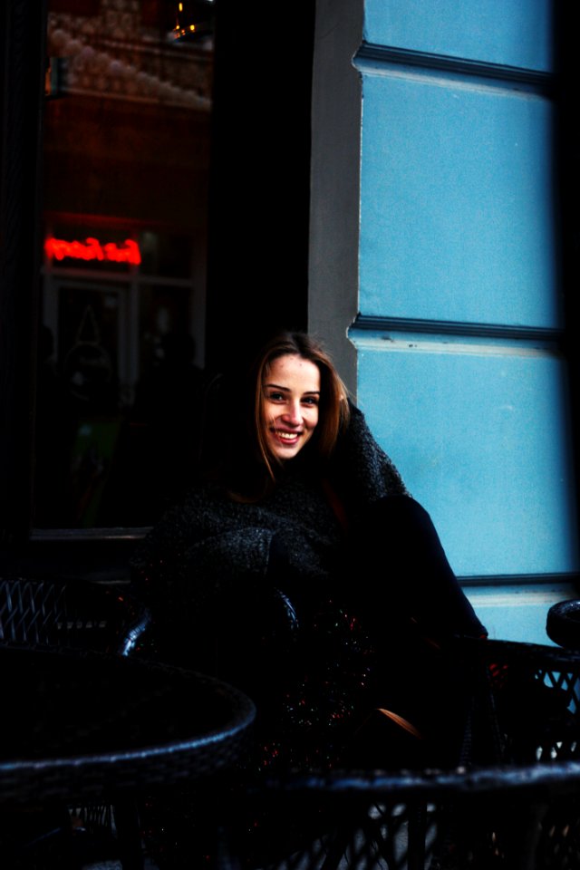 Woman Wearing Blue Crew-neck Sweater And Pants