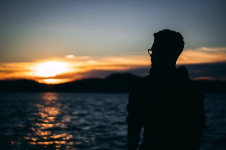Silhouette Of Man During Sunrise photo