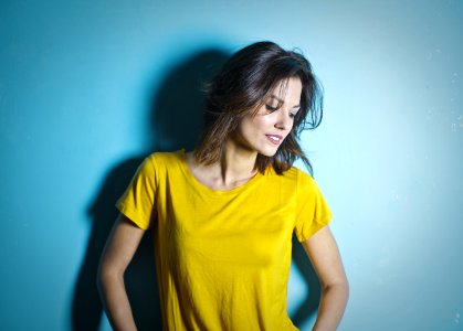 Woman Wearing Yellow Scoop Neck Shirt photo