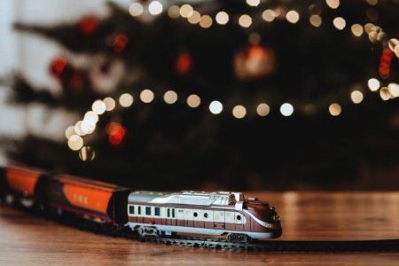 Shallow Focus Photography On Gray Train Plastic Toy photo