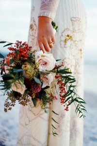 Woman Holding Bouquet Of Flowers photo