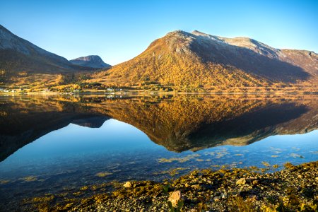 Landscape Photo Of Mountains And Body Of Water photo