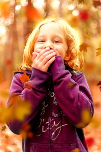 Toddler Wearing Purple Sweatshirt