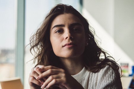 Woman In Grey Sweater