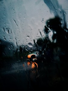 Shallow Focus Photography Of Rain On The Window photo
