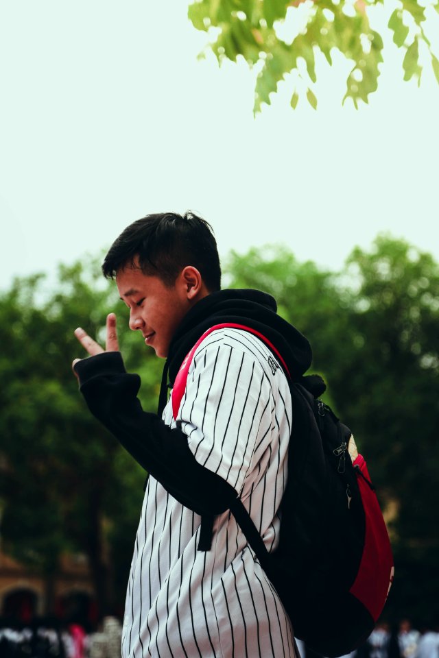 Boy In Peace Sign