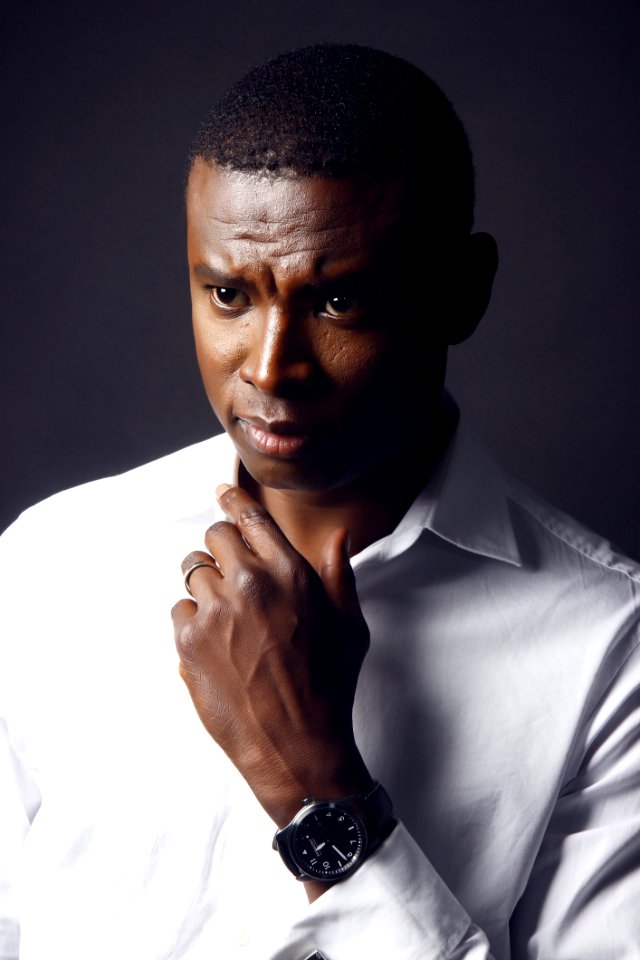 Photography Of Man In White Shirt With Round Black Analog Watch