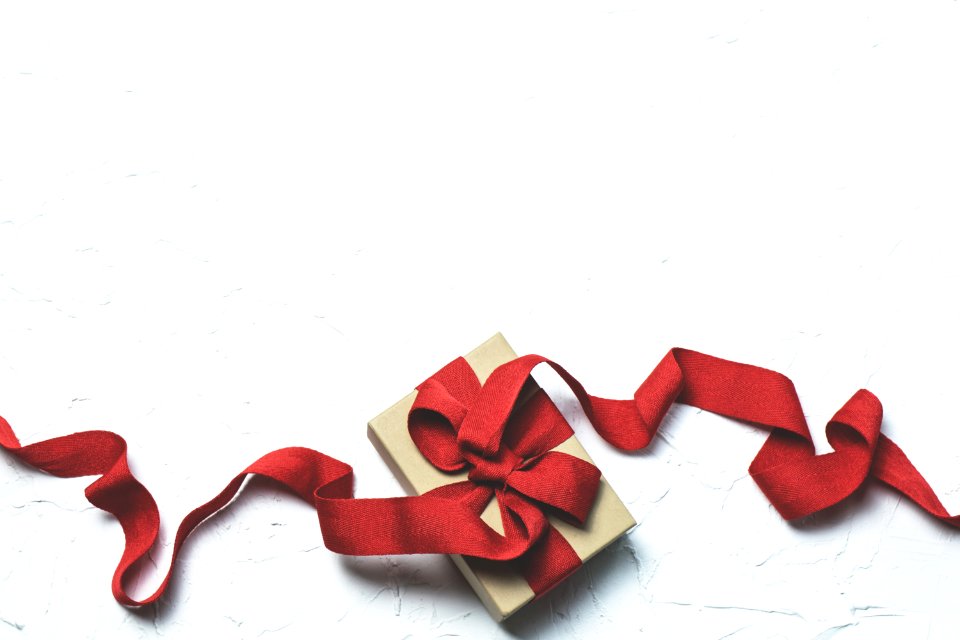 Red And White Gift Box With Ribbon Bow photo