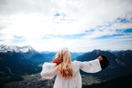 White Dressed Girl Across Black Mountains