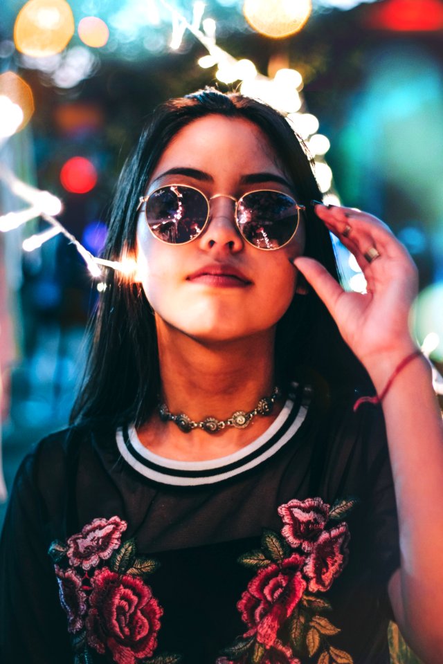 Woman In Black Crew-neck T-shirt And Hippie Sunglasses photo