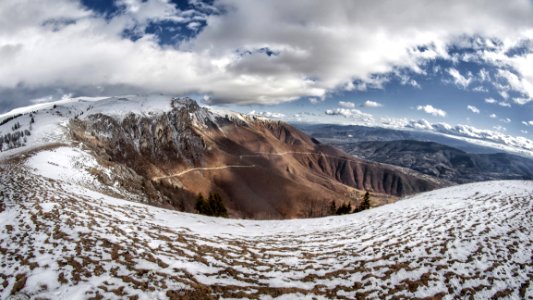 Landscape Photo Of Snowy Mountain Under Cloudy Sky