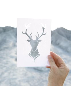 Person Holding Reindeer Artwork