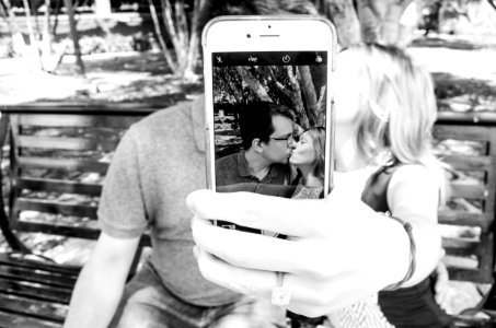 Gray Scale Photo Of Man And Woman Taking A Selfie photo