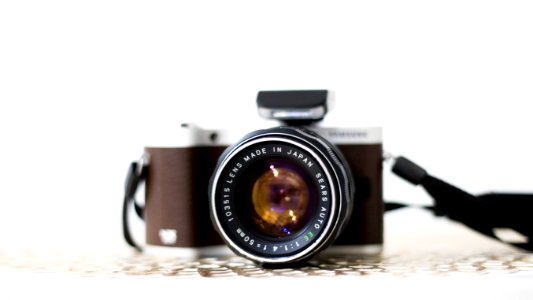 Black And Brown Dslr Camera photo