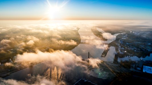 White Clouds Through The Sun Scenery