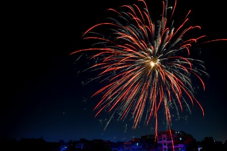 Fireworks Display Over Building photo