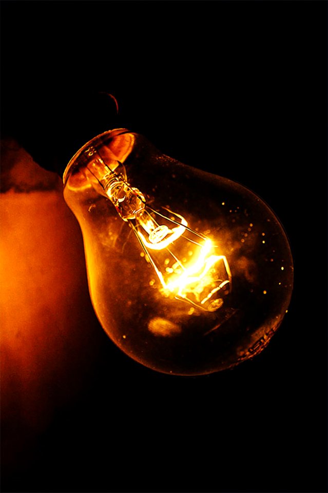 Close-up Photography Of Lighted Light Bulb photo