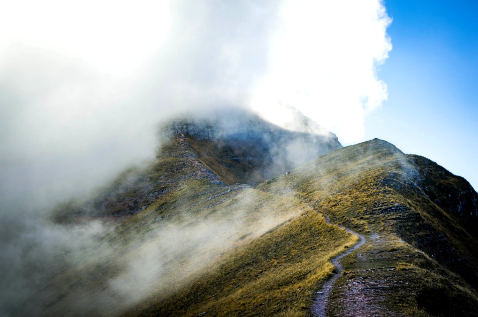 Cloud Covered Mountain Top On Landscape Photography photo