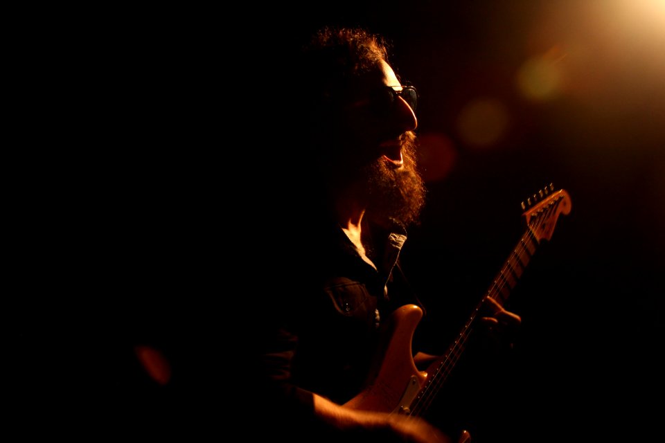 Man Playing Electric Guitar photo