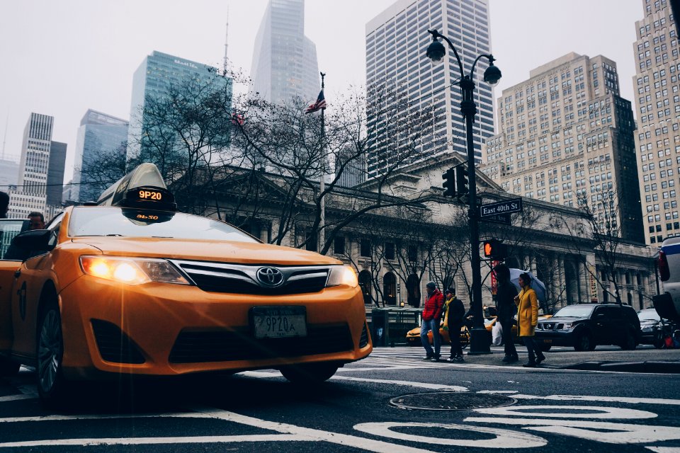 Yellow Toyota Sedan On In Highway Road