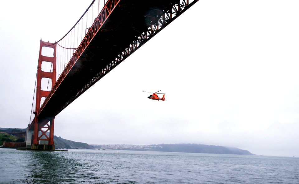 Rescue Helicopter Flying Under Golden Gate Bridge