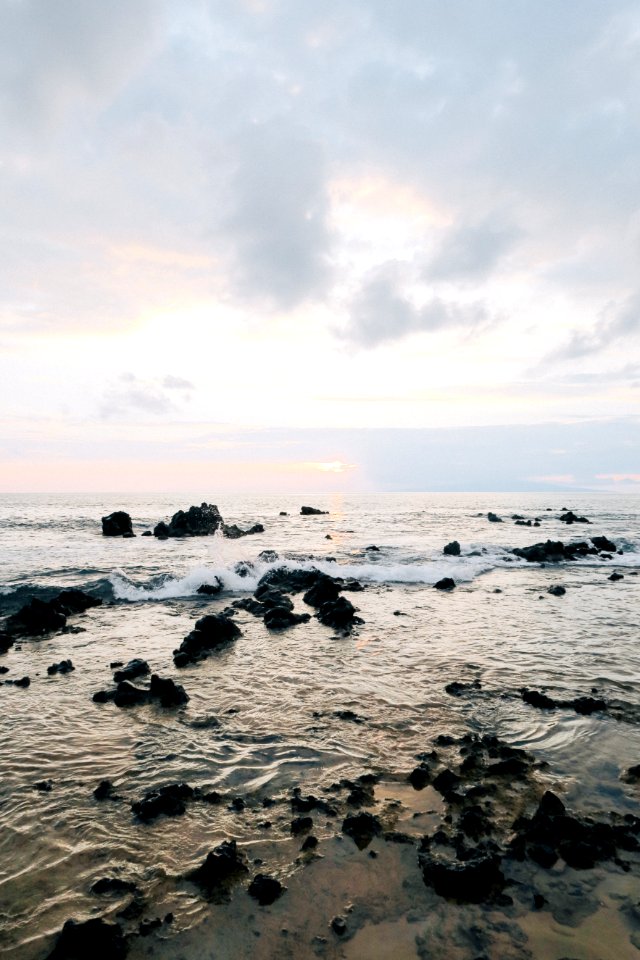 Body Of Water At Cloudy Sky