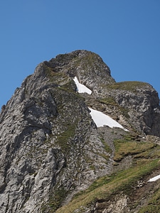 Steep exposed mountain peak photo