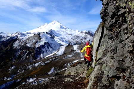 Hiker In Mountains photo