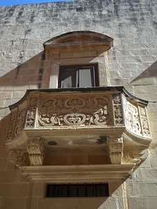 Balcony sand stone window photo