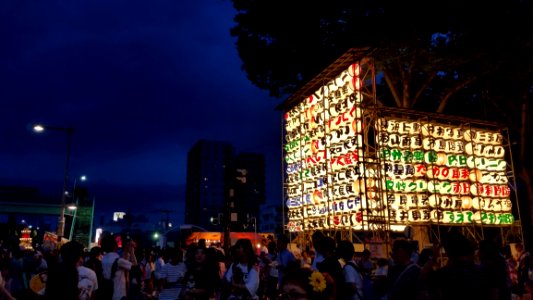 Group Of People Near Multicolored Lantern Display photo