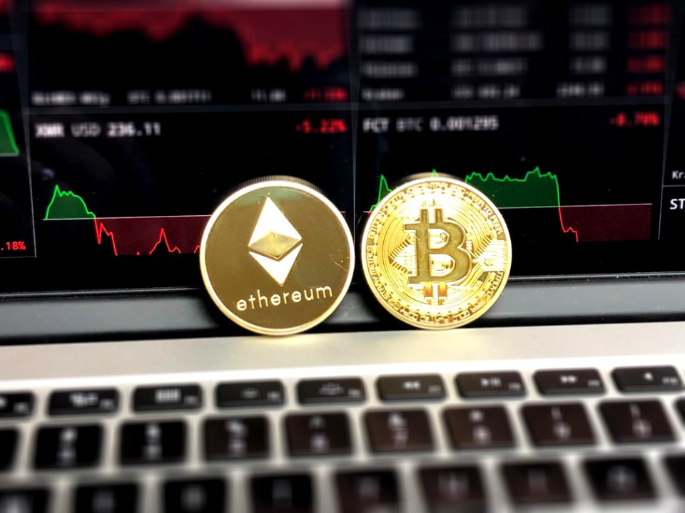 Ethereum And Bitcoin Emblems