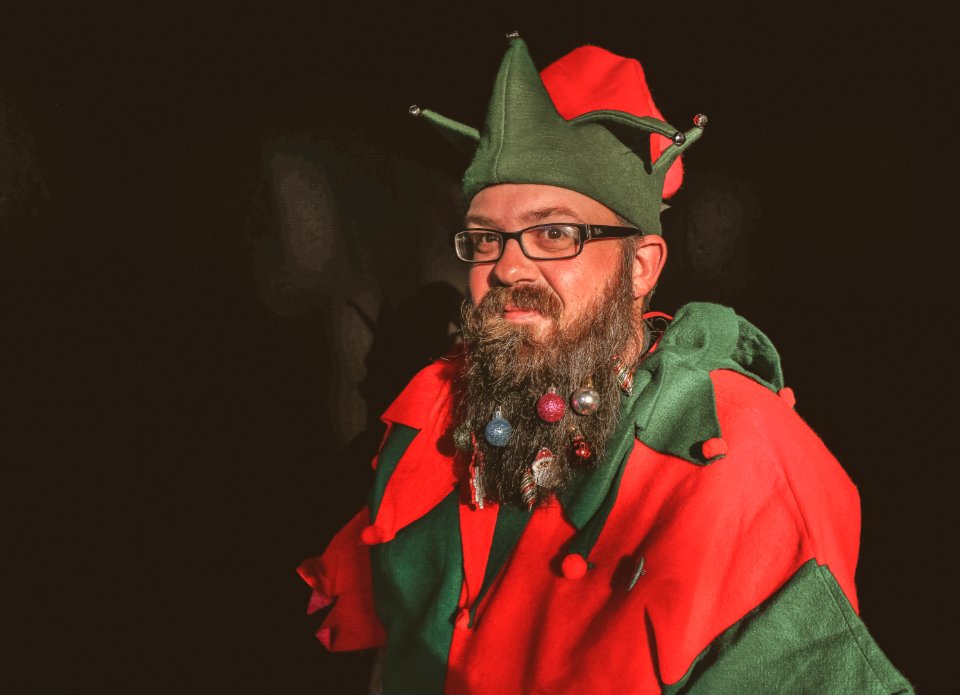 Man In Red And Green Elf Costume