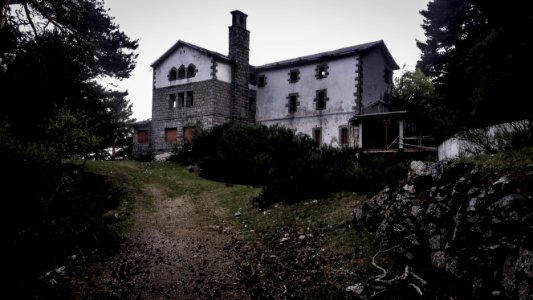 Photo Of An Abandoned Concrete House photo