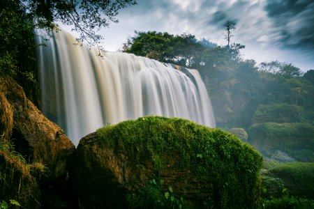 Photography Of Waterfalls Surrounded By Trees photo