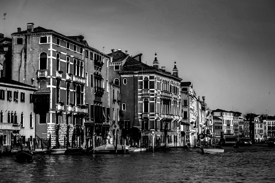 Concrete Houses Beside Body Of Water photo