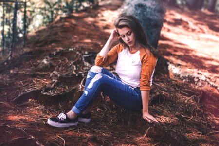 Woman Sitting On Ground photo