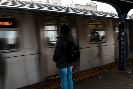 Photo Of Woman Waiting At The Train Station photo